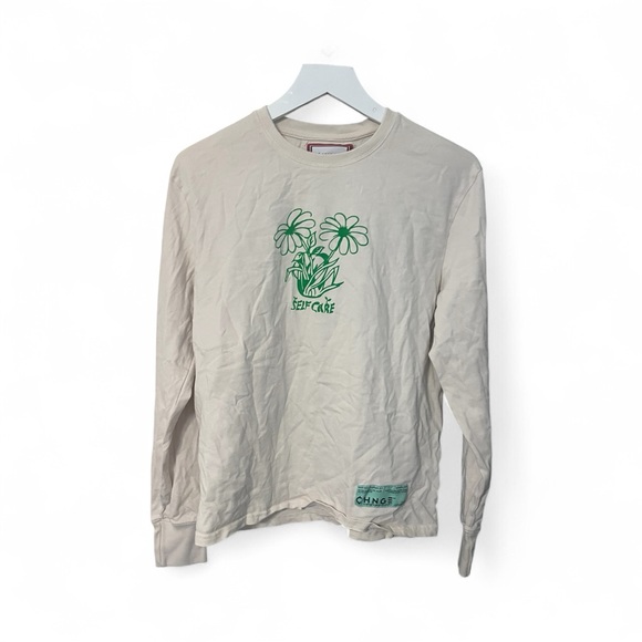CHNGE Tops - CHNGE Cream Long Sleeve Tee with Green Floral Graphic